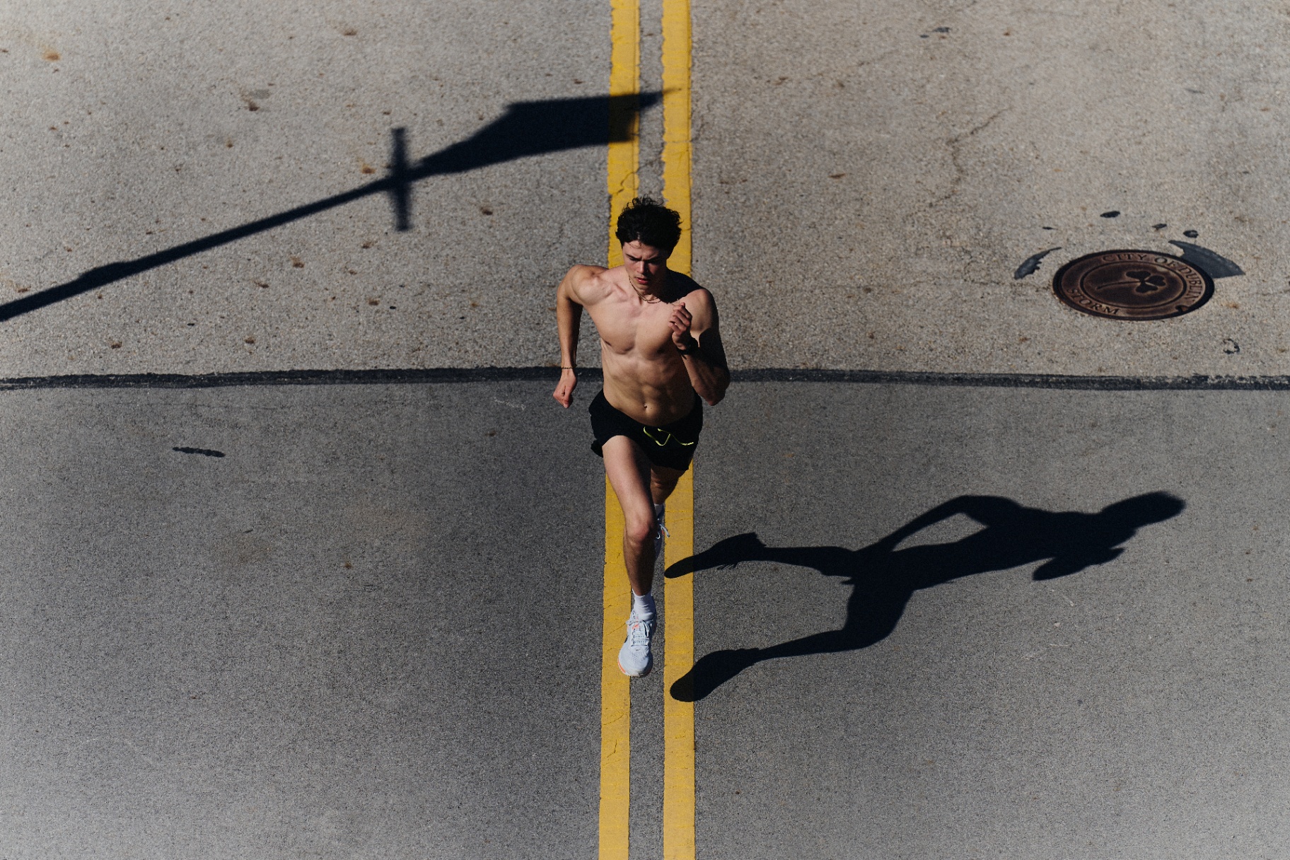 Runner captured from above on open road